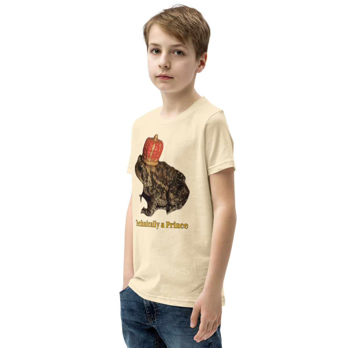 Youth t-shirt mockup — photograph of a pet toad wearing a tiny crown, captioned 'Technically a Prince'