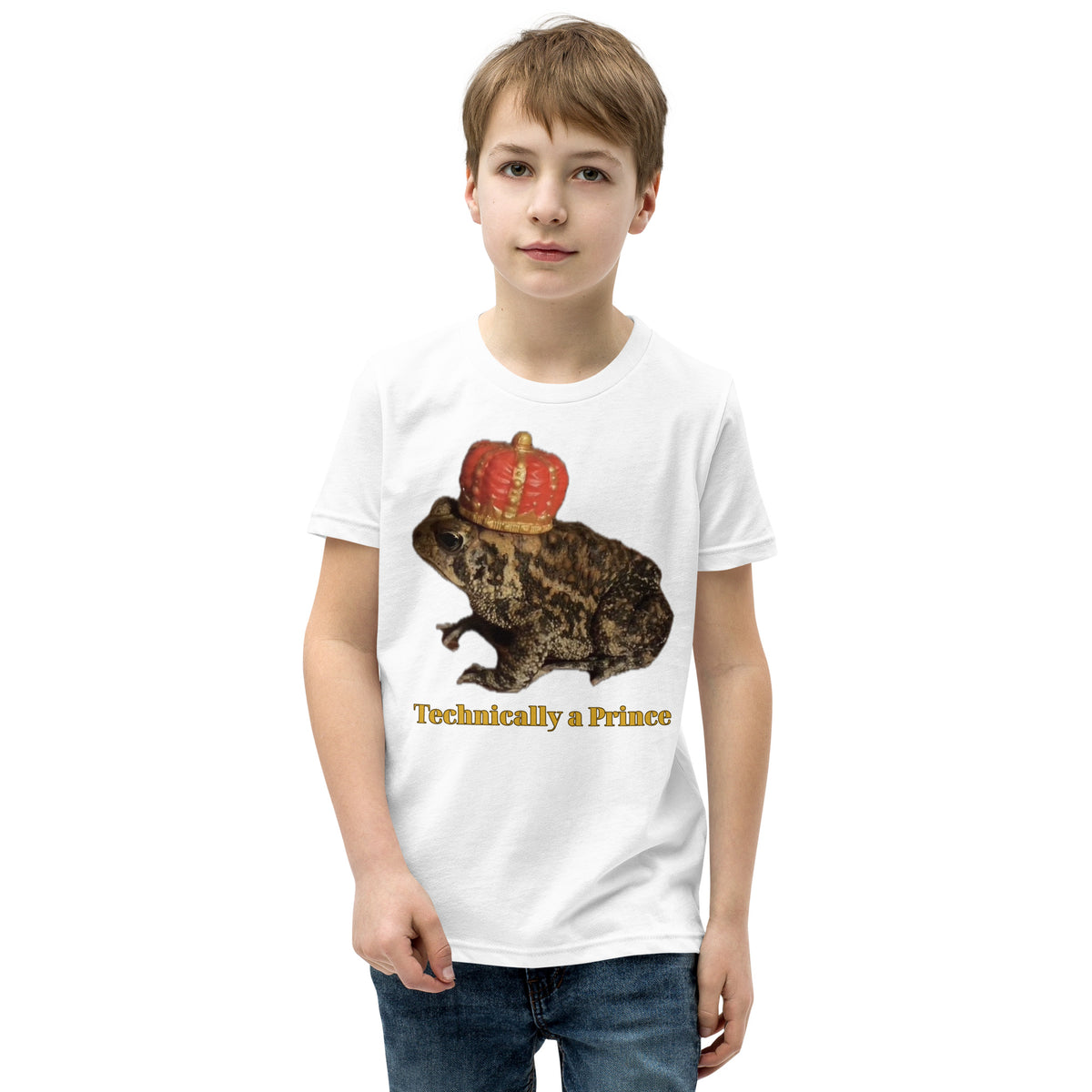 Youth t-shirt mockup — photograph of a pet toad wearing a tiny crown, captioned 'Technically a Prince'