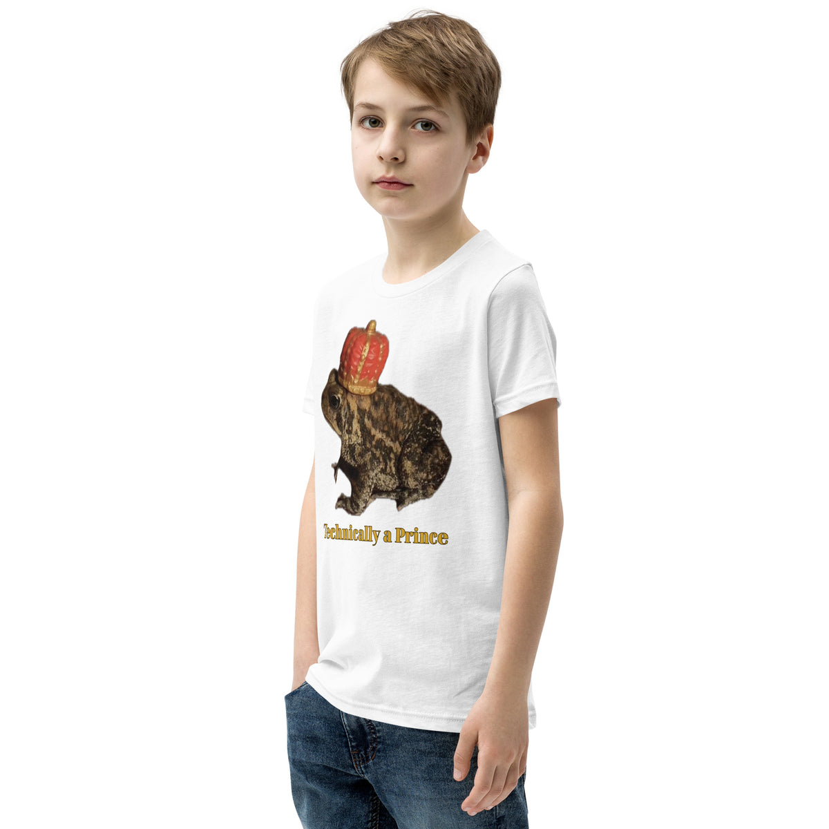 Youth t-shirt mockup — photograph of a pet toad wearing a tiny crown, captioned 'Technically a Prince'