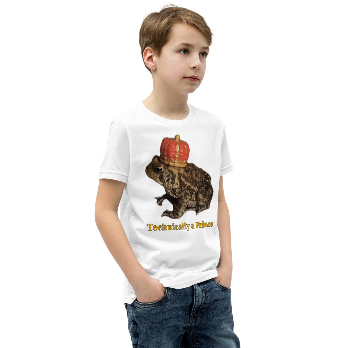 Youth t-shirt mockup — photograph of a pet toad wearing a tiny crown, captioned 'Technically a Prince'